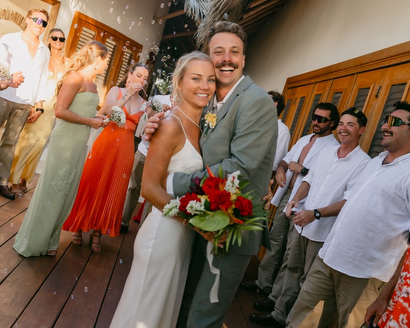 Wedding party celebrating with the bride and groom, Dominican Republic